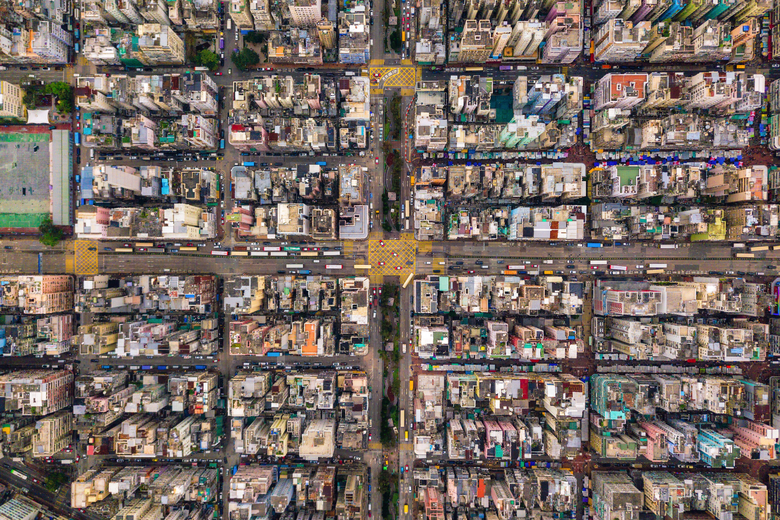 Aerial view of intersections or junctions in Sham Shui Po, Shek Kip Mei, Hong Kong Downtown. Financial district and business centers in smart city, technology concept. Top view of buildings.